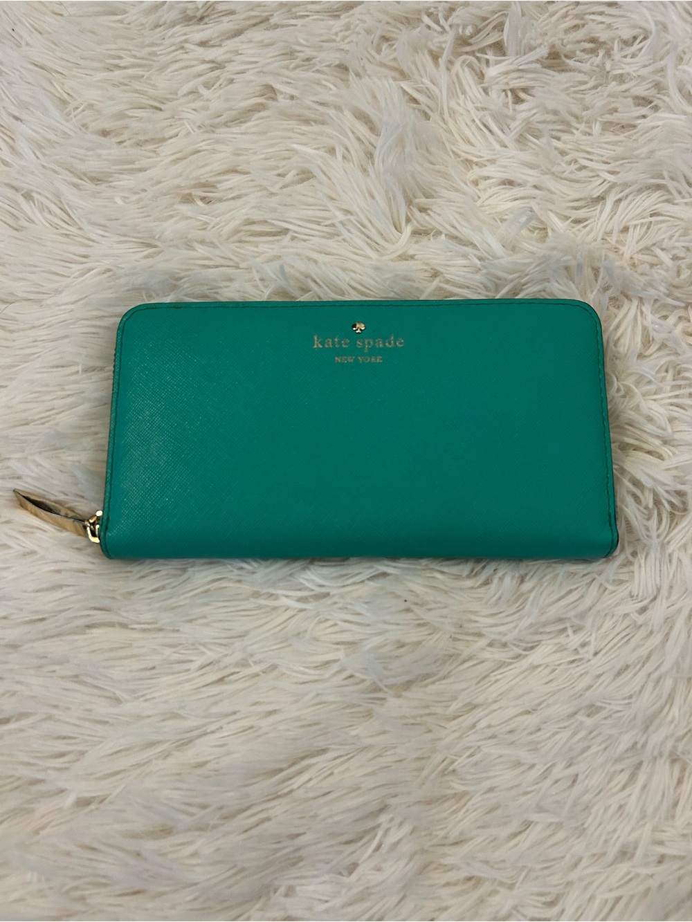kate spade teal zip-around saffiano wallet with gold logo